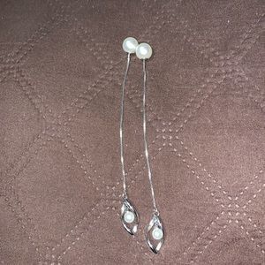 Woman’s long earrings